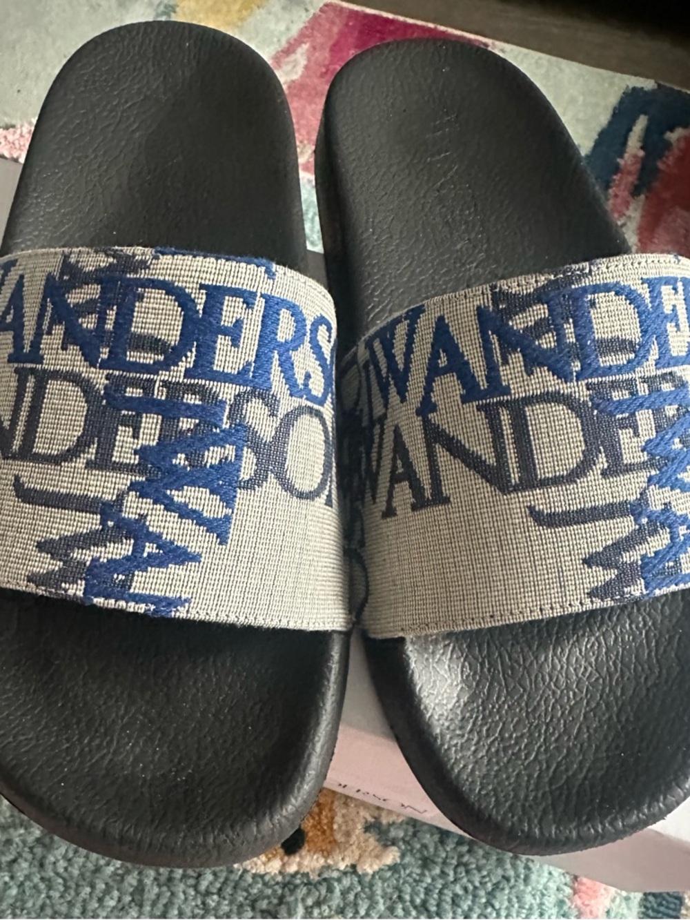 J.W. Anderson Black Footbed Slides with multicolor Straps and Blue Logo